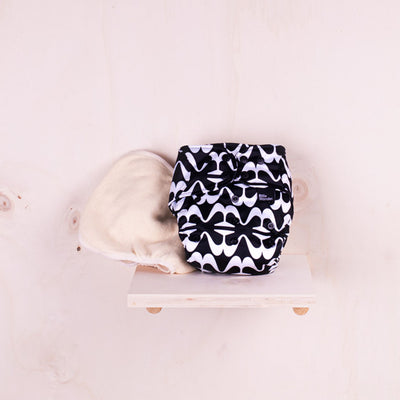 the daytime, a black and white wrap with inserts
