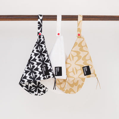 Billie Wonder midi wetbags in colors black and white, gold and not white: hanging