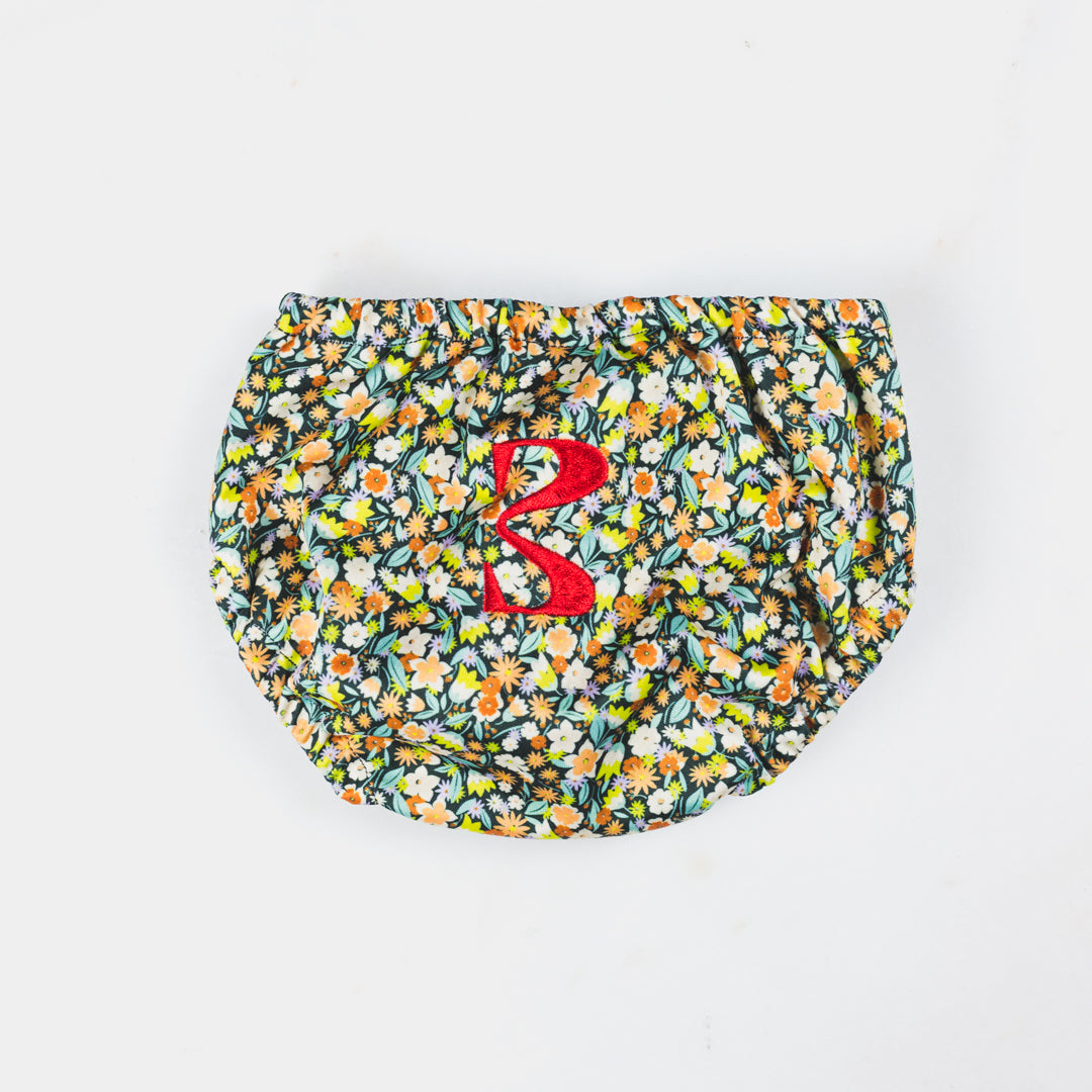 the MAMA'EN swim diaper in flower design back with embroidered B logo
